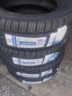 205/70R16 ( 4 NEW LIONSPORT TIRES installed with balance included