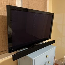 60in TV with Stand And Soundbar