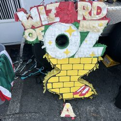 Wizard of Oz" themed piñata, which is a collectible item for party celebrations