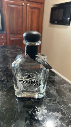 8 - Don Julio 70 Empty Tequila Bottles