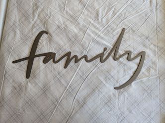 Silver tone metal family wall decoration