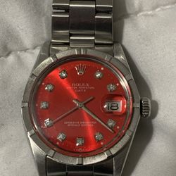 Authentic ROLEX Stainless Steel Date Model . Red Diamond Dial