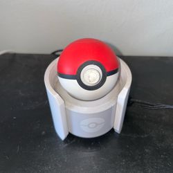 Poke Ball And The Charging Stand 