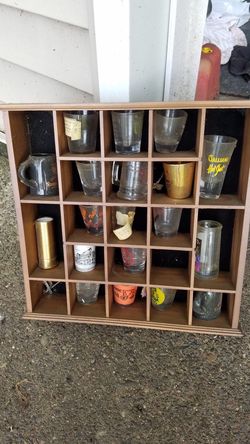 Shot glass shelf - holds 21 glasses