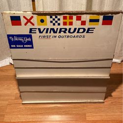 Evinrude outboard motor tin display stand