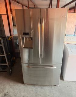 GE Stainless Steel Refrigerator And Freezer