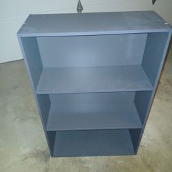 Small gray bookcase