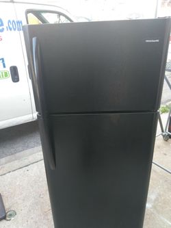 Scratch and dent used black refrigerator