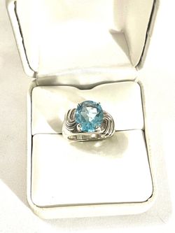 Brand new .925 silver cocktail ring with Swiss blue topaz size 5