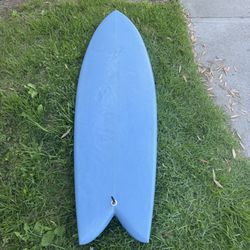 5’8” custom Trueline fish surfboard with leash