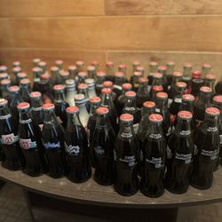 collectors coca cola bottles from 1980’s, 90’s, and beyond. 