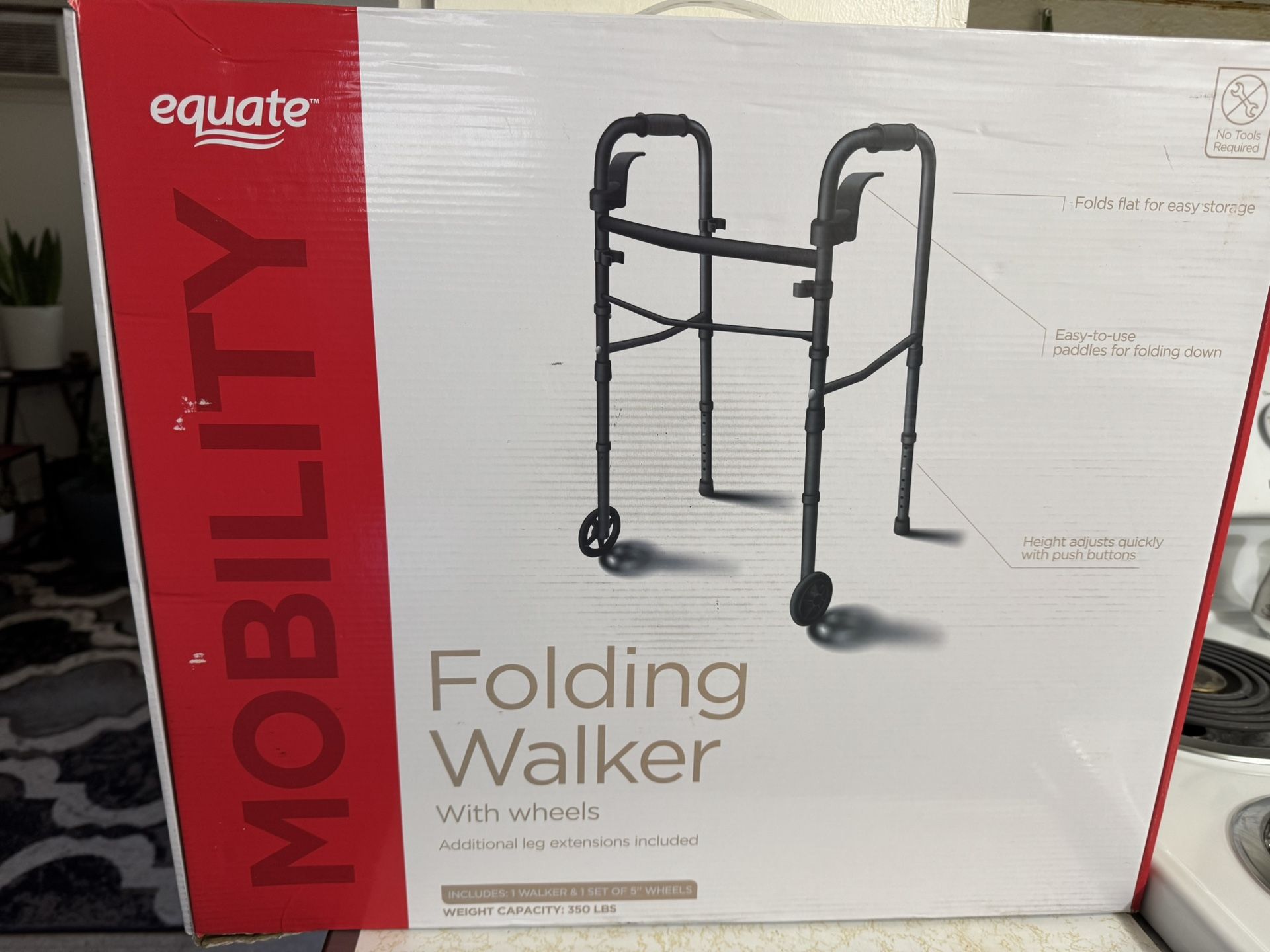BRAND NEW, IN BOX, FOLDING WALKER