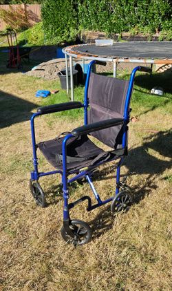 McKesson Aluminum Transport Chair.