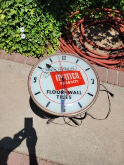 Vintage advertising clock 1955