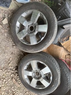 Two Bridgestone Tires and Rims 255/60R19