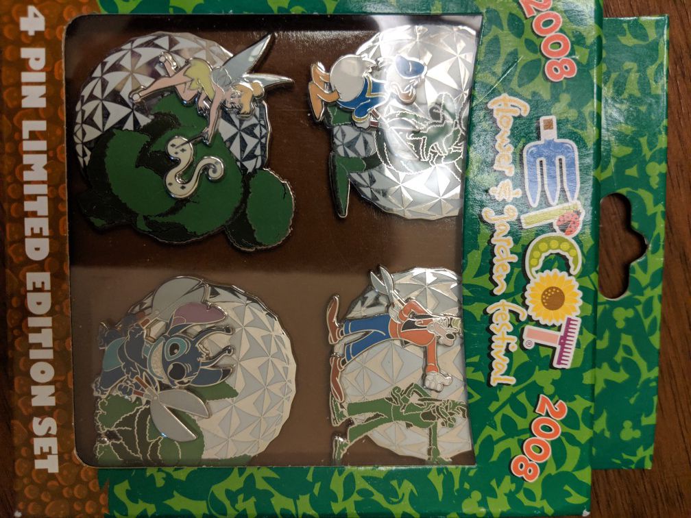 Disney four pin limited edition set of 500 from Epcot flower and garden festival 2008 featuring Stitch, Tinkerbell, Donald and Goofy