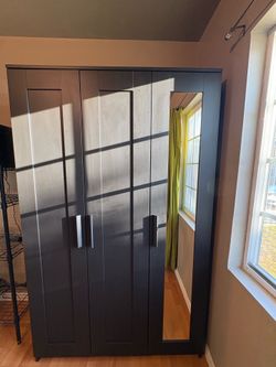 IKEA BRIMNES wardrobe featuring three doors