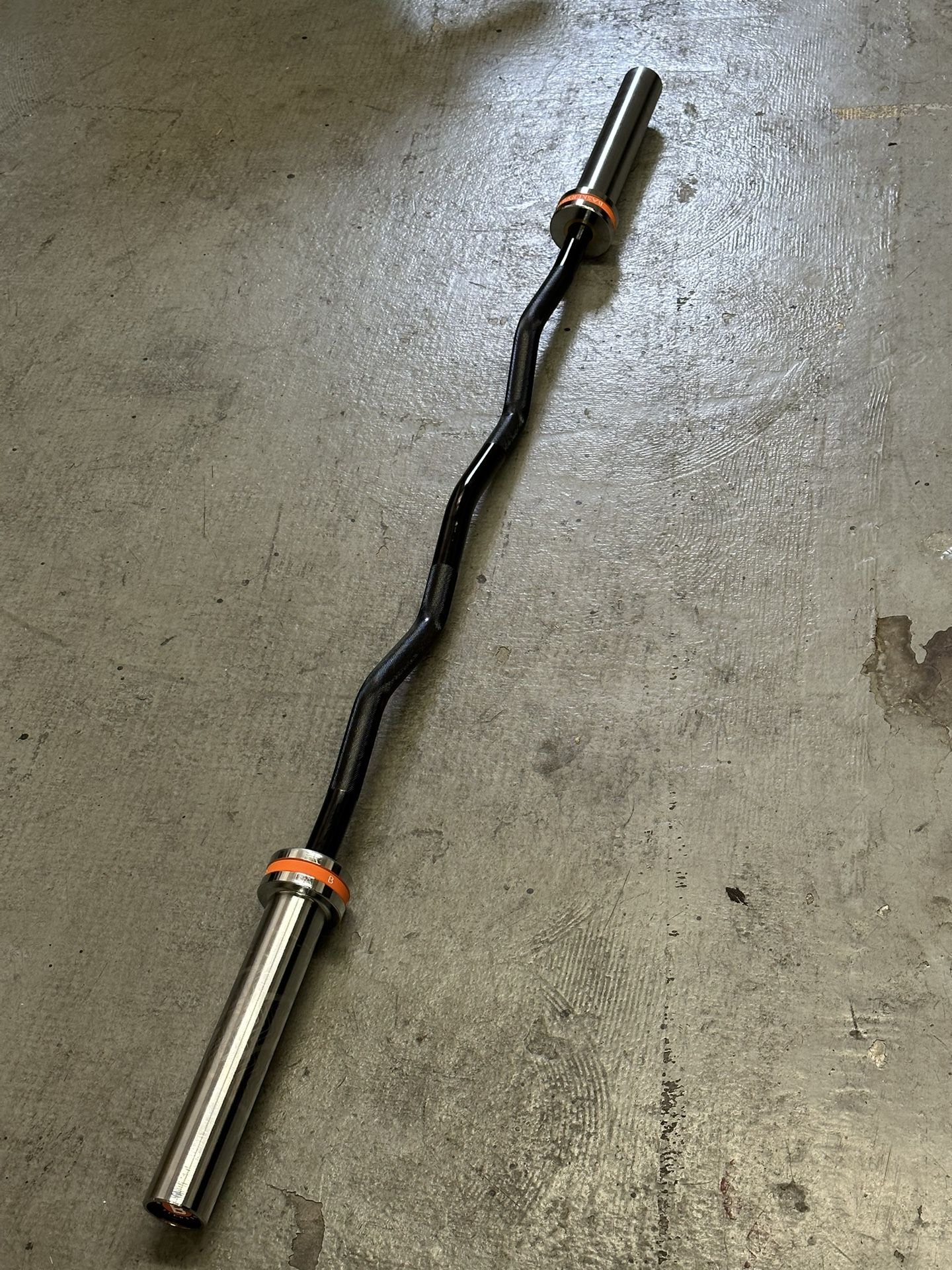 Olympic Needle Bearing Curl Bar. Brand new still in the box.