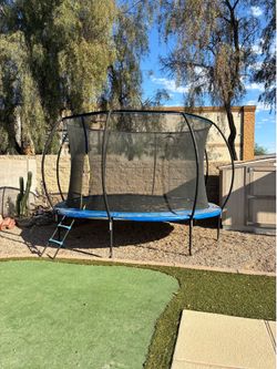 Trampoline with sprinklers attached
