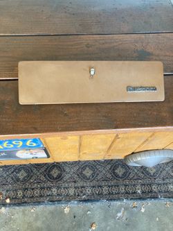Glove box door off a 1975 Ford pick up.