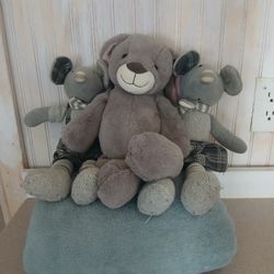 Stuffed animals and blanket