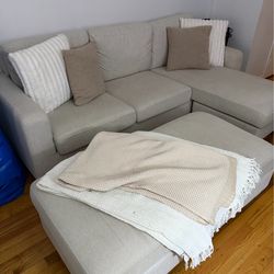 Couch 88”long with storage ottoman makes couch into a bed
