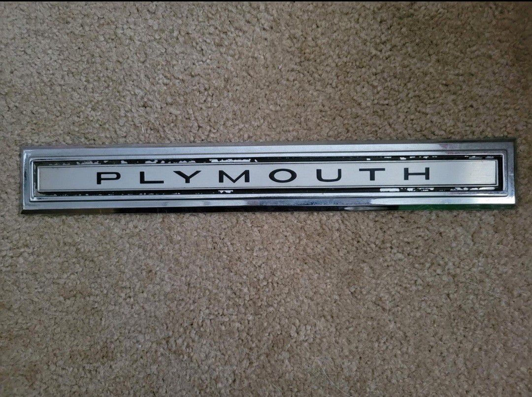 Vintage metal Plymouth car name emblem