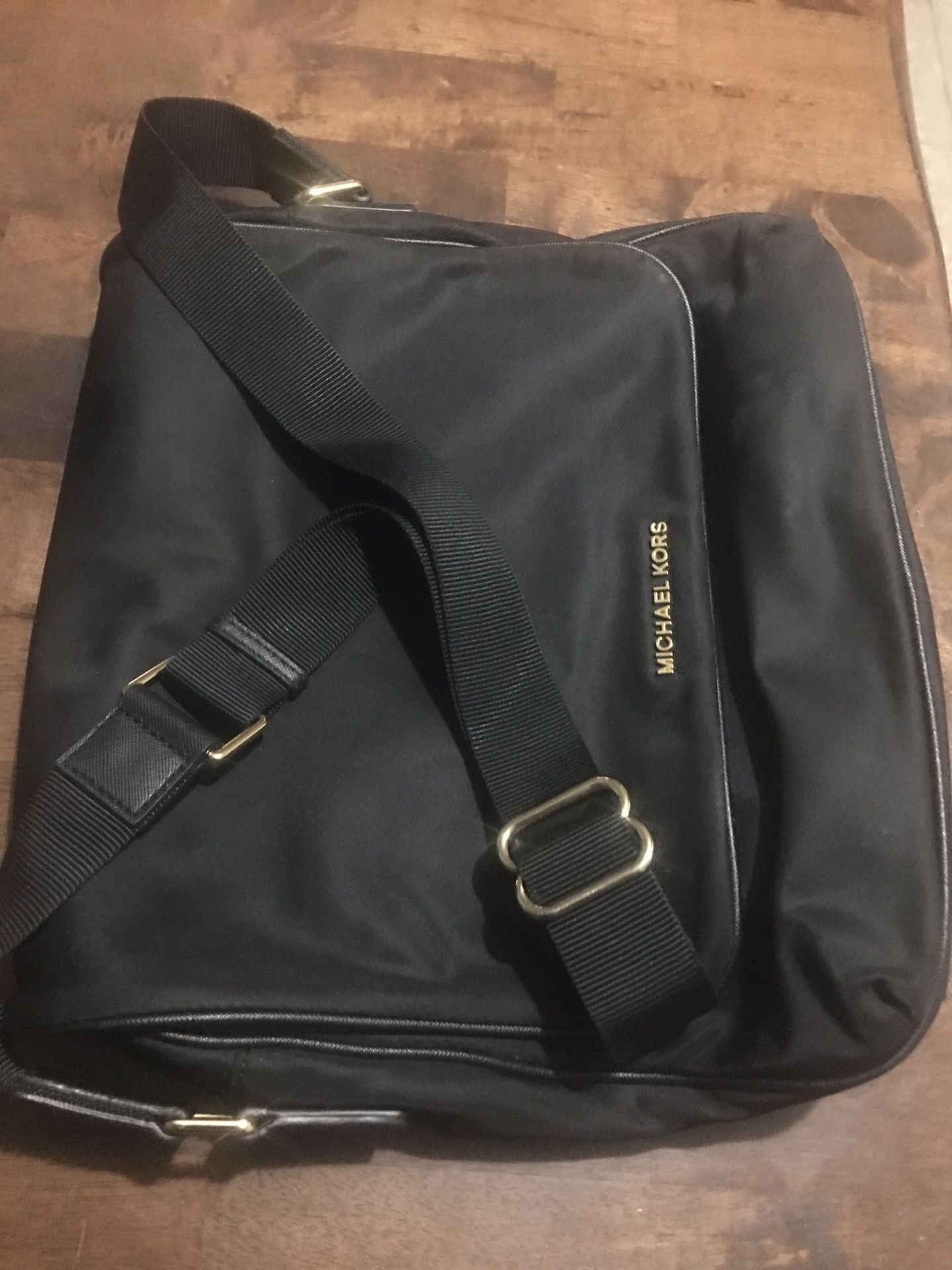 Brand new with no tags unisex black Michael Kors messenger bag