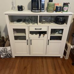 white storage cabinet, coffee bar