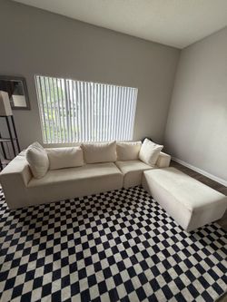 Cloud couch set and checker board carpet