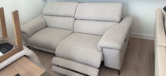 Motorized recliner sofa