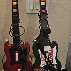 Two Red Octane Guitar Hero Guitars for Sony PlayStation 2 (PS2)