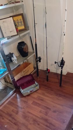 Fishing poles.and tackle box with some tackel