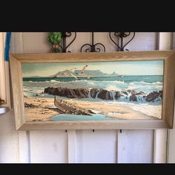 Ocean Painting with Seagulls in a pretty gray frame. 27“ high and 47“ wide.