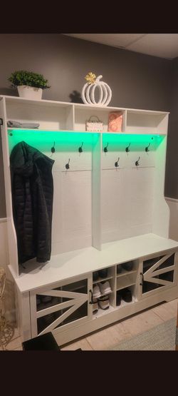 Hat , jacket, and shoe rack unit