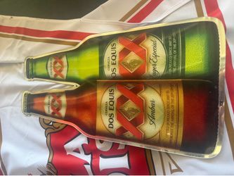 Dos XX beer sign