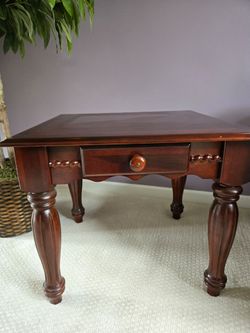 Dark wood coffee table and 2 end tables