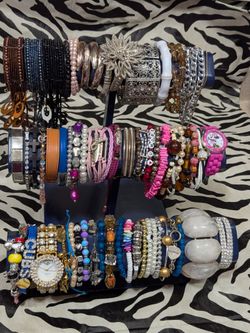 Large Collection of Fashion Jewelry with Metal Display Stand