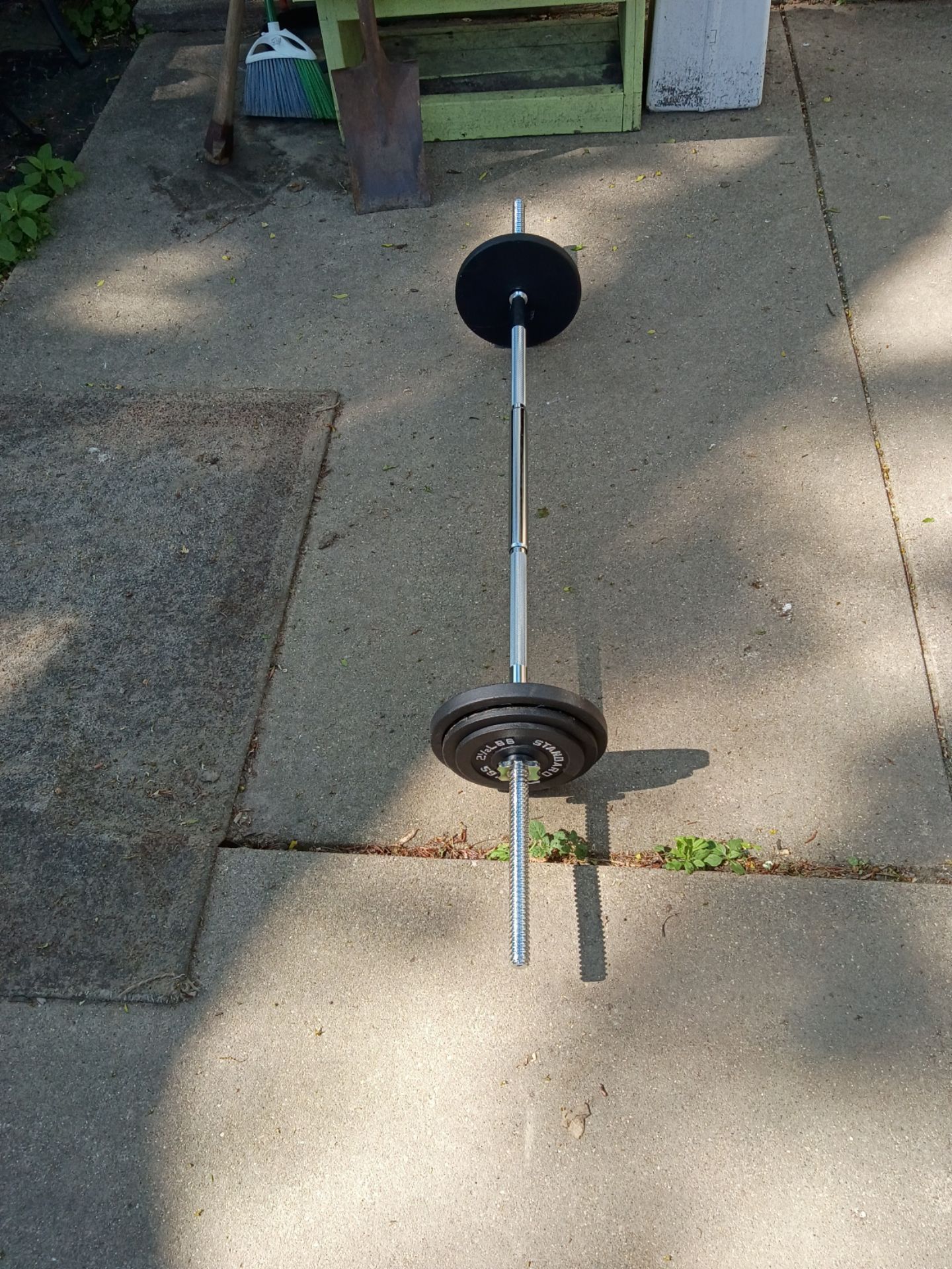 Barbell stainless steel with 35 lbs of weights