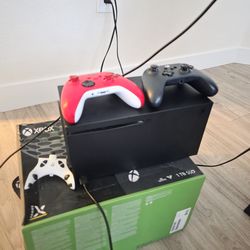 Xbox series x with strike pack and 2 controllers.