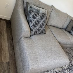 Two piece sofa with chase