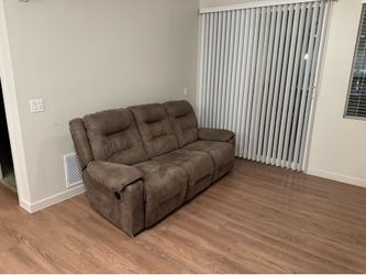 Ashley furniture 3- Seat Reclining Sofa in- good condition