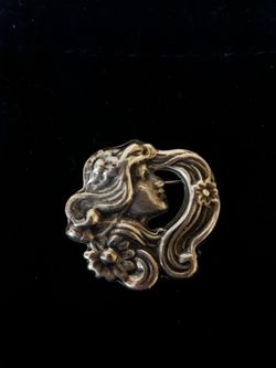 Sterling silver made in Mexico lady with flowers in her hair brooch