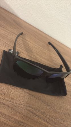 New Oakley Sliver black w/green lens