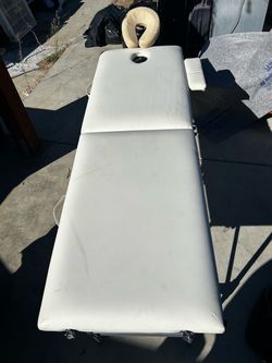 Massage Table with Face Cradle and one Armrest. Measurements are in the photos