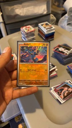 Riolu Masterball Pattern Prismatic Evolutions #050 NM Holofoil Pokémon Card