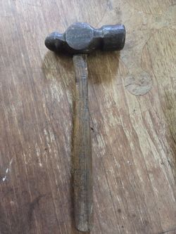 A vintage Fairmount 40 oz ball-peen hammer is a heavy-duty, industrial-grade machinist and mechanic hand tool made in the United States by the Fairmo