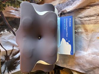 Contoured memory foam support pillow