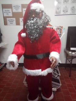 Black Santa, Sings American/Spanish.     Black Friday 