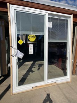 New patio door Pella with blinds size w70.3/4 h79.1/2 $875